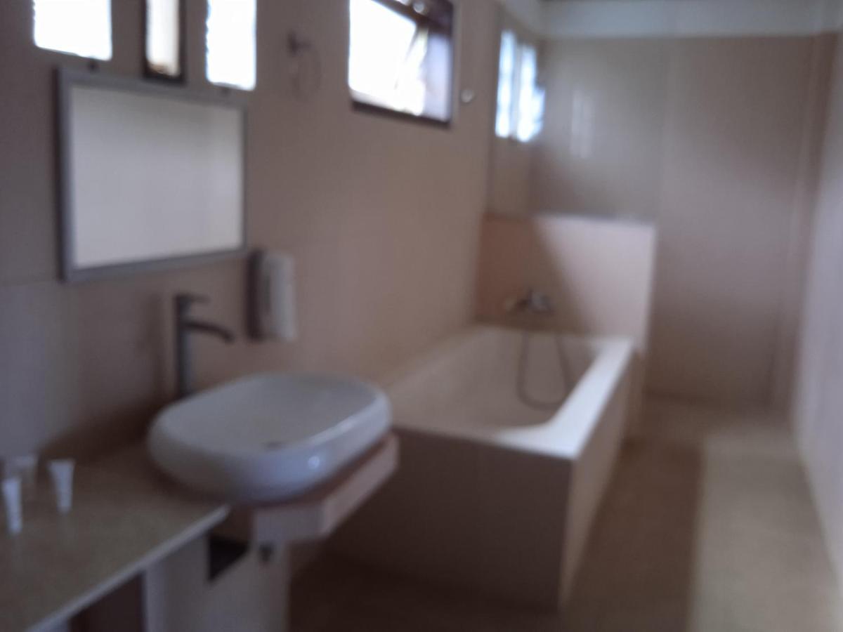 Family House Hotel Kuta Kuta  Kültér fotó